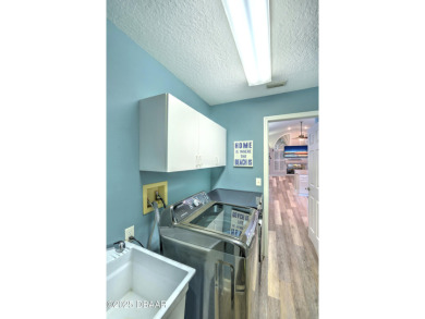 Beautifully remodeled and meticulously maintained, this on Spruce Creek Golf Club in Florida - for sale on GolfHomes.com, golf home, golf lot