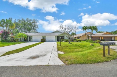 Pristine EAGLEWOOD Community with tennis and golf and great on Eagle Wood Golf Course in Florida - for sale on GolfHomes.com, golf home, golf lot