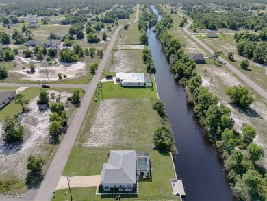 Build your dream home on this waterfront lot in beautiful Cape on Burnt Store Golf Club in Florida - for sale on GolfHomes.com, golf home, golf lot