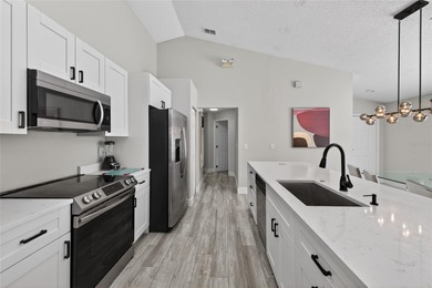 This is your chance to own a beautifully updated pool home! on Southern Dunes Golf and Country Club in Florida - for sale on GolfHomes.com, golf home, golf lot