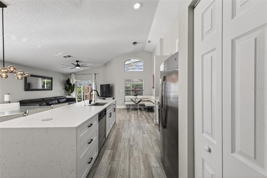 This is your chance to own a beautifully updated pool home! on Southern Dunes Golf and Country Club in Florida - for sale on GolfHomes.com, golf home, golf lot