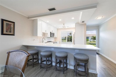 Welcome to this charming villa near the Heart of Naples, tucked on The Glades Golf and Country Club in Florida - for sale on GolfHomes.com, golf home, golf lot