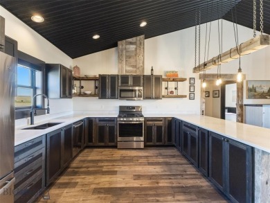 Don't miss the chance to own this exquisite luxurious home on Madison Meadows Golf Course in Montana - for sale on GolfHomes.com, golf home, golf lot