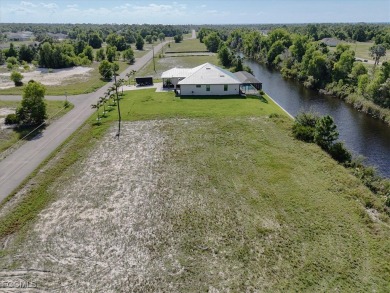 Build your dream home on this waterfront lot in beautiful Cape on Burnt Store Golf Club in Florida - for sale on GolfHomes.com, golf home, golf lot