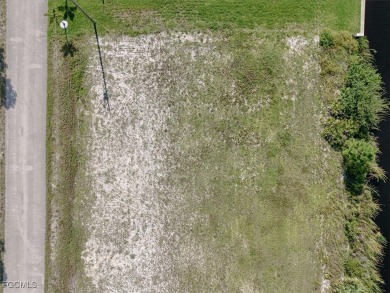 Build your dream home on this waterfront lot in beautiful Cape on Burnt Store Golf Club in Florida - for sale on GolfHomes.com, golf home, golf lot