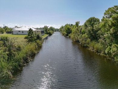 Build your dream home on this waterfront lot in beautiful Cape on Burnt Store Golf Club in Florida - for sale on GolfHomes.com, golf home, golf lot