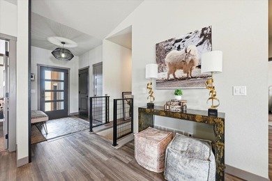 Property presented by Ashley S. Goodrich, SRS with RE/MAX In The on Elkhorn Ridge Golf Course in South Dakota - for sale on GolfHomes.com, golf home, golf lot