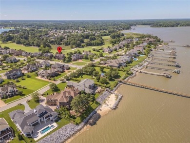 Come experience resort-style living in this stunning 3-story on Riverfront Golf Club in Virginia - for sale on GolfHomes.com, golf home, golf lot