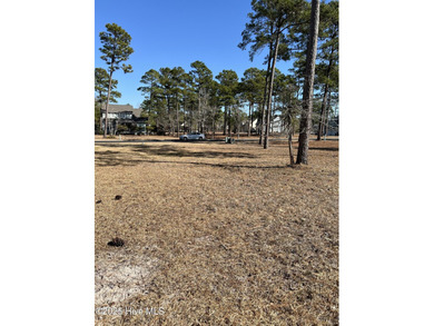 Beautiful and elevated homesite to build the home of your dreams on Rivers Edge Golf Club in North Carolina - for sale on GolfHomes.com, golf home, golf lot