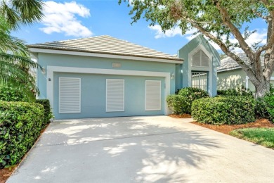 Well-maintained golf cottage offers privacy inside and out on Oak Harbor Country Club in Florida - for sale on GolfHomes.com, golf home, golf lot