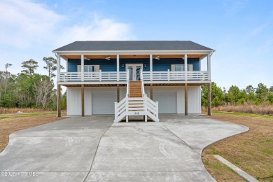 Welcome to 318 Landon Lane in Marsh Haven Landing, your on North Shore Country Club in North Carolina - for sale on GolfHomes.com, golf home, golf lot