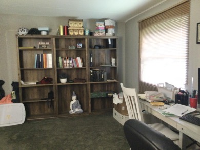 This meticulously maintained and rare three bedroom, with office on Spanish Lakes I in Florida - for sale on GolfHomes.com, golf home, golf lot