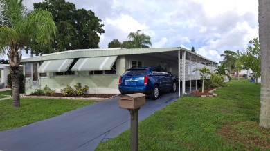 This meticulously maintained and rare three bedroom, with office on Spanish Lakes I in Florida - for sale on GolfHomes.com, golf home, golf lot