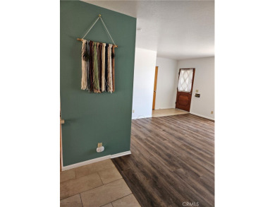 Comfortable retirement living awaits in this almost 1200 square on Panorama Village Golf Course in California - for sale on GolfHomes.com, golf home, golf lot