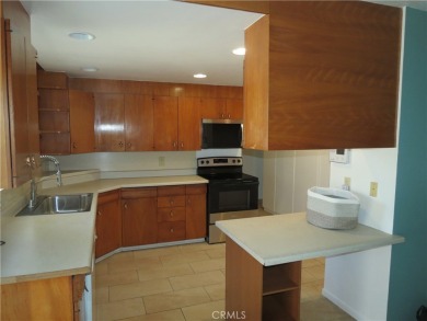 Comfortable retirement living awaits in this almost 1200 square on Panorama Village Golf Course in California - for sale on GolfHomes.com, golf home, golf lot