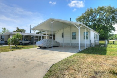 2002 Perimeter lot home. With 3-bed, 2-bath featuring desirable on Barefoot Bay Golf Course in Florida - for sale on GolfHomes.com, golf home, golf lot