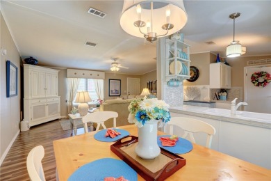 2002 Perimeter lot home. With 3-bed, 2-bath featuring desirable on Barefoot Bay Golf Course in Florida - for sale on GolfHomes.com, golf home, golf lot