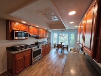 Timber Pines 2 Bedroom Home 2 Full Bathrooms And A Screened 2 on Timber Pines Golf Course in Florida - for sale on GolfHomes.com, golf home, golf lot