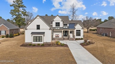 This custom-built home located on the fairway of #16 golf course on Taberna Country Club in North Carolina - for sale on GolfHomes.com, golf home, golf lot