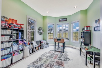 This exquisite home welcomes you through the custom Mahogany on Uniontown Country Club in Pennsylvania - for sale on GolfHomes.com, golf home, golf lot