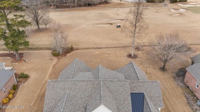 This custom-built home located on the fairway of #16 golf course on Taberna Country Club in North Carolina - for sale on GolfHomes.com, golf home, golf lot