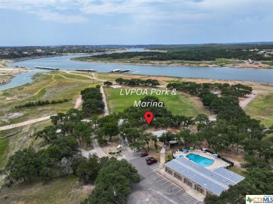 Nestled in the charming lakeside community of Lago Vista, this on Bar-K Golf Course in Texas - for sale on GolfHomes.com, golf home, golf lot