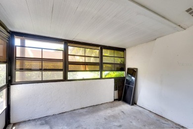 FIXER UPPER. Freshly painted and all carpet removed, it's now on Bradenton Country Club in Florida - for sale on GolfHomes.com, golf home, golf lot