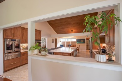This beautifully renovated home is located on the 6th green of on Country Club of Bristol in Tennessee - for sale on GolfHomes.com, golf home, golf lot
