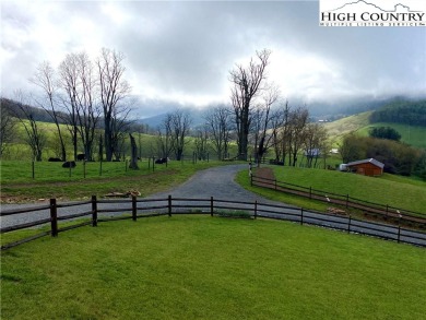 Twin Oaks Mountain Estates is a private Gated Community in the on New River Country Club in North Carolina - for sale on GolfHomes.com, golf home, golf lot