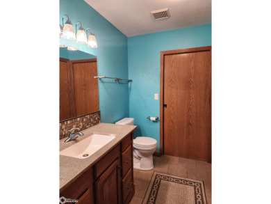 Golf & nature at your doorstep! Discover this charming two on Crestwood Hills Golf Course in Iowa - for sale on GolfHomes.com, golf home, golf lot