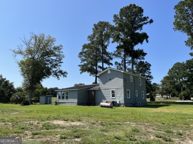 Enjoy country living in this beautifully remodeled home on 2 on Green Acres Golf and Recreation Club in Georgia - for sale on GolfHomes.com, golf home, golf lot