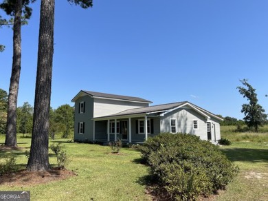 Enjoy country living in this beautifully remodeled home on 2 on Green Acres Golf and Recreation Club in Georgia - for sale on GolfHomes.com, golf home, golf lot