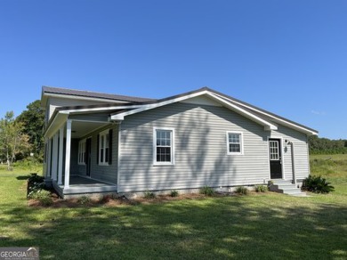 Enjoy country living in this beautifully remodeled home on 2 on Green Acres Golf and Recreation Club in Georgia - for sale on GolfHomes.com, golf home, golf lot