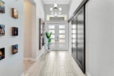 Elegance meets coastal style in this former model home! on Orchid Island Golf and Beach Club in Florida - for sale on GolfHomes.com, golf home, golf lot