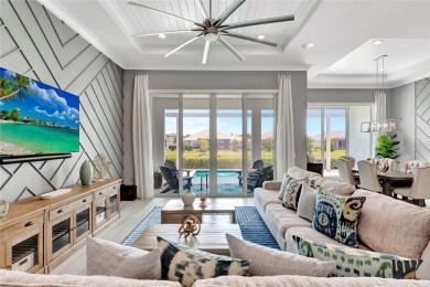 Elegance meets coastal style in this former model home! on Orchid Island Golf and Beach Club in Florida - for sale on GolfHomes.com, golf home, golf lot