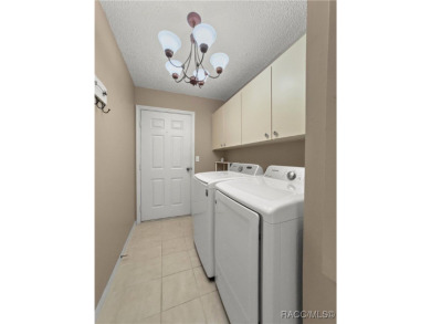 This charming 3-bedroom, 2-bathroom gem with a 2-car garage is on Stonecrest Golf and Club Club in Florida - for sale on GolfHomes.com, golf home, golf lot