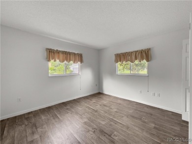 This charming 3-bedroom, 2-bathroom gem with a 2-car garage is on Stonecrest Golf and Club Club in Florida - for sale on GolfHomes.com, golf home, golf lot