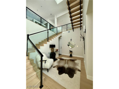 Experience sophisticated living in this 4-story Christopher Vu on Dragon Ridge Country Club in Nevada - for sale on GolfHomes.com, golf home, golf lot