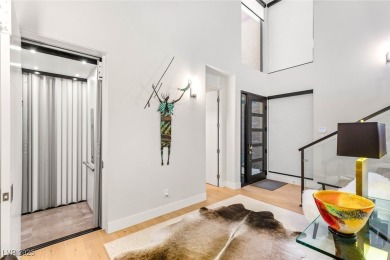 Experience sophisticated living in this 4-story Christopher Vu on Dragon Ridge Country Club in Nevada - for sale on GolfHomes.com, golf home, golf lot