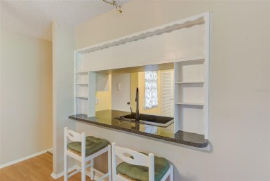 Rarely available, first floor, 3 bedroom, 2 bath corner unit on Largo Golf Course in Florida - for sale on GolfHomes.com, golf home, golf lot