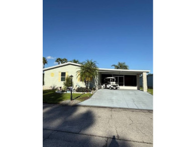 Imagine every day having coffee or lunch on your private deck on Hamptons Golf Club in Florida - for sale on GolfHomes.com, golf home, golf lot