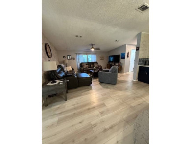 Imagine every day having coffee or lunch on your private deck on Hamptons Golf Club in Florida - for sale on GolfHomes.com, golf home, golf lot