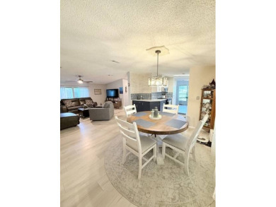 Imagine every day having coffee or lunch on your private deck on Hamptons Golf Club in Florida - for sale on GolfHomes.com, golf home, golf lot