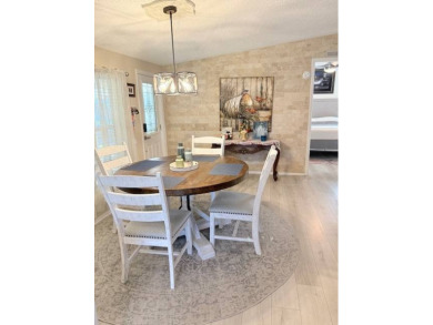 Imagine every day having coffee or lunch on your private deck on Hamptons Golf Club in Florida - for sale on GolfHomes.com, golf home, golf lot