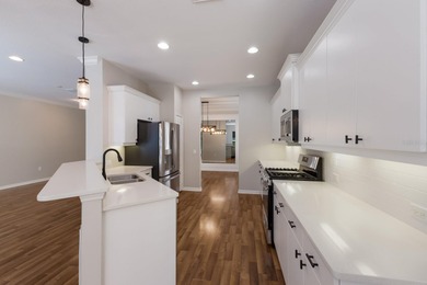 Welcome to a home that feels like vacation the moment you arrive on Esplanade Golf and Country at Lakewood Ranch in Florida - for sale on GolfHomes.com, golf home, golf lot