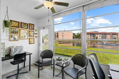 Spectacular remodeled first-floor condo with stunning lake view on Sunrise Lakes Phase III in Florida - for sale on GolfHomes.com, golf home, golf lot
