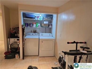This 4 bedroom, 2 bath split level home sits in an amenity on Pocono Farms Country Club in Pennsylvania - for sale on GolfHomes.com, golf home, golf lot