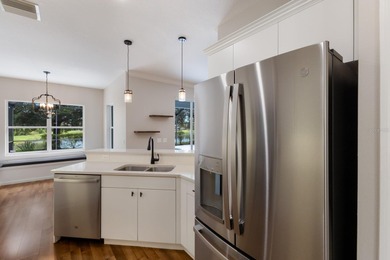 Welcome to a home that feels like vacation the moment you arrive on Esplanade Golf and Country at Lakewood Ranch in Florida - for sale on GolfHomes.com, golf home, golf lot