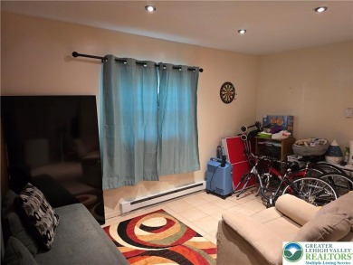 This 4 bedroom, 2 bath split level home sits in an amenity on Pocono Farms Country Club in Pennsylvania - for sale on GolfHomes.com, golf home, golf lot