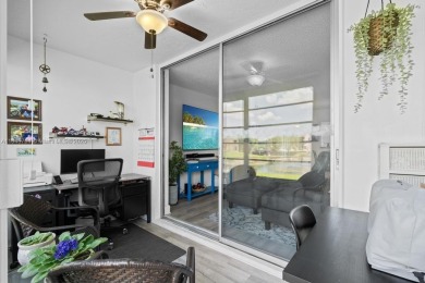 Spectacular remodeled first-floor condo with stunning lake view on Sunrise Lakes Phase III in Florida - for sale on GolfHomes.com, golf home, golf lot